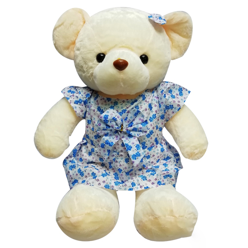 Cream color teddy with blue bow-image-0